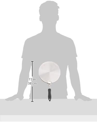 Mauviel | M'PLUS Induction Interface Disc held by person, showcasing its compact design for efficient heat distribution on induction cooktops. Ideal accessory for non-induction cookware.