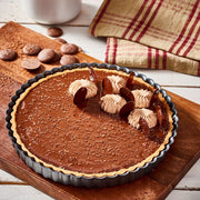 De Buyer Decor Nozzle + Adaptor Kit on display, featuring stainless steel tips for elegant pastry designs, ideal for bakers seeking to enhance their creations.