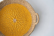 NEEPA HUT - Iris Tray I Yellow, a handwoven seagrass tray with colorful accents, perfect for serving or organizing, reflecting artisan craftsmanship from the Philippines.