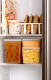 W&P - Freezer Cube Storage Containers: Set of 3 - Small/Medium/Large neatly stack in a refrigerator, showcasing their practical design for efficient food storage.