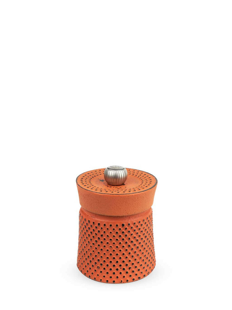 Peugeot Bali Cast Iron Pepper Mill, 3 Inches - Red, featuring a decorative, perforated design with a ribbed silver knob, perfect for enhancing culinary experiences.
