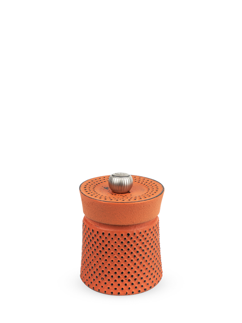 Peugeot | Bali Cast Iron Pepper Mill, Orange, with a perforated clay-and-metal design, ideal for grinding spices, inspired by traditional tea ceremonies.