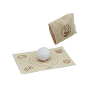 PlanToys | Bread Loaf Set displayed with a white ball representing bread dough on a bread-kneading mat, part of a realistic baking play set.