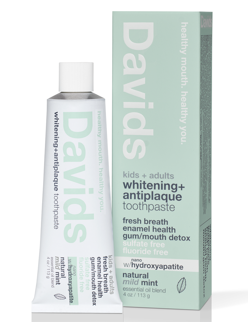 Davids Natural Toothpaste: Nano-hydroxyapatite formula for kids and adults, promoting natural whitening and enamel health, 4 oz tube beside its packaging.