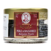Reale | Balsamic Pearls - Classic, a close-up of a jar showcasing gourmet balsamic pearls, ideal for enhancing culinary creations.