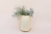 NEEPA HUT - Hanging Storage basket, traditionally used by farmers, now stylishly holds yoga mats or decoratively stores items, featuring indigenous zig-zag patterns crafted from bamboo/rattan.