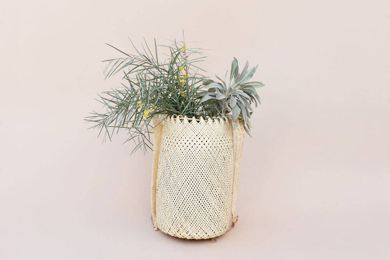 NEEPA HUT - Hanging Storage basket, traditionally used by farmers, now stylishly holds yoga mats or decoratively stores items, featuring indigenous zig-zag patterns crafted from bamboo/rattan.
