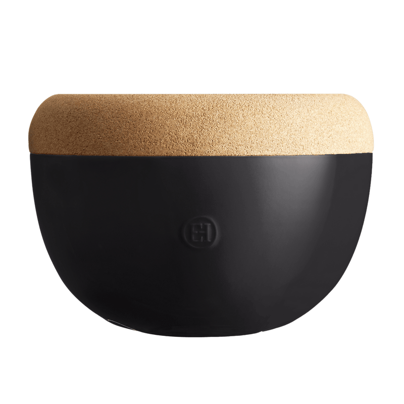 Emile Henry | Deep Storage Bowl, Truffle: A modern half-sphere container with a matte black ceramic base and removable cork lid, ideal for preserving fruits and root vegetables.