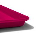 Great Jones | Little Sheet - Pepper, a nonstick quarter-sized baking tray, perfect for small ovens and personal bakes, showcased in a close-up image.