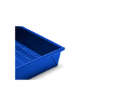 Great Jones | Square One - Blueberry baking pan with a wavy, corrugated bottom for easy release, suitable for even, golden results. Oven-safe, dishwasher-friendly, nonstick, and nontoxic.