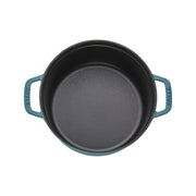 Staub | Round Cocottes - 4 qt Turquoise, an empty cast-iron pot with side handles, ideal for slow-cooking and even heat distribution, perfect for culinary enthusiasts.