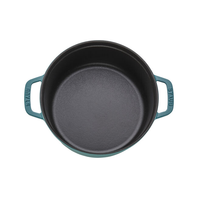 Staub | Round Cocottes - 4 qt Turquoise, an empty cast-iron pot with side handles, ideal for slow-cooking and even heat distribution, perfect for culinary enthusiasts.