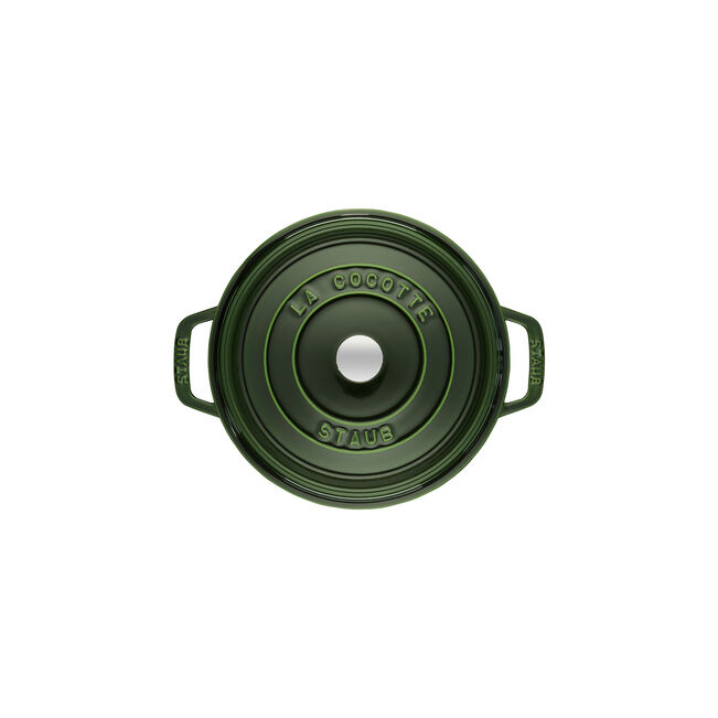 Staub | Round Cocottes - 7 qt Basil: Top view of green enamel lid with embossed LA COCOTTE STAUB, featuring side handles and central knob for self-basting.