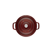 Staub | Round Cocottes - 7 qt Grenadine: Red enameled cast-iron Dutch oven with side handles and self-basting lid, ideal for family meals.