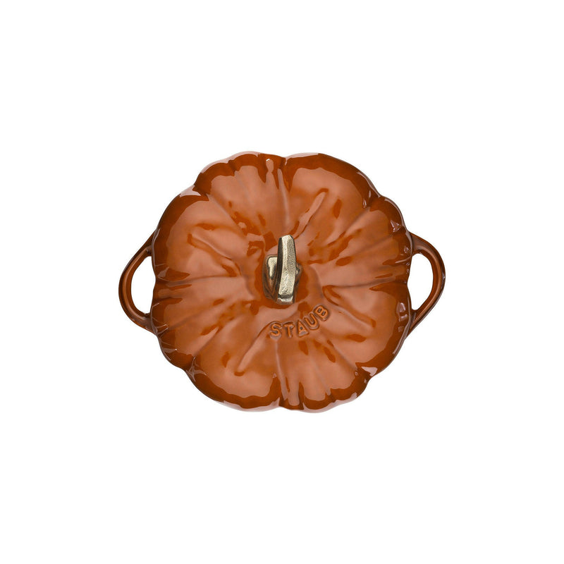 Staub Pumpkin Cocotte - White, a cast iron pot shaped like a Cinderella pumpkin, ideal for slow-cooking, enhancing kitchen decor with its whimsical design.