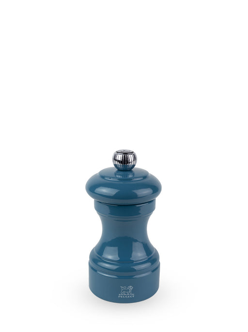 Peugeot | Bistro Pepper Mill, Pacific Blue: A blue lacquered Peugeot pepper grinder with metal adjustment knob, showcasing the iconic Peugeot lion logo at its base.
