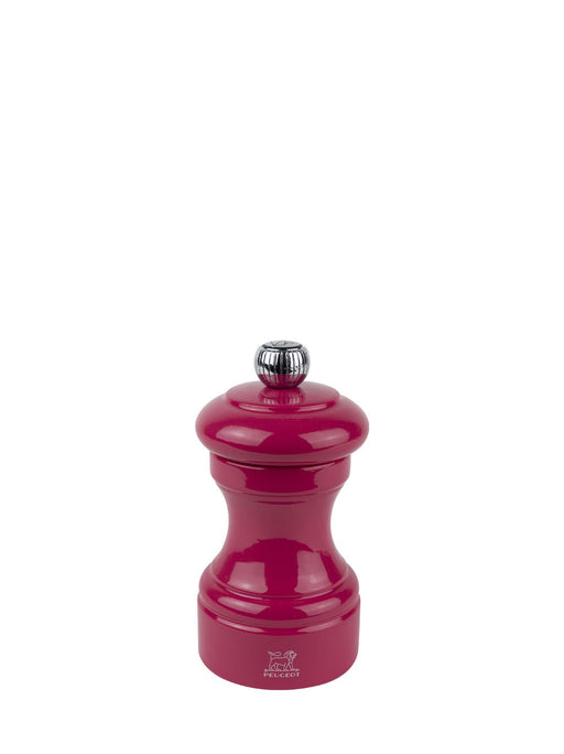 Peugeot | Bistro Pepper Mill in Candy Pink, featuring the classic Paris profile with chrome adjustment knob and Peugeot lion logo, perfect for precise seasoning.