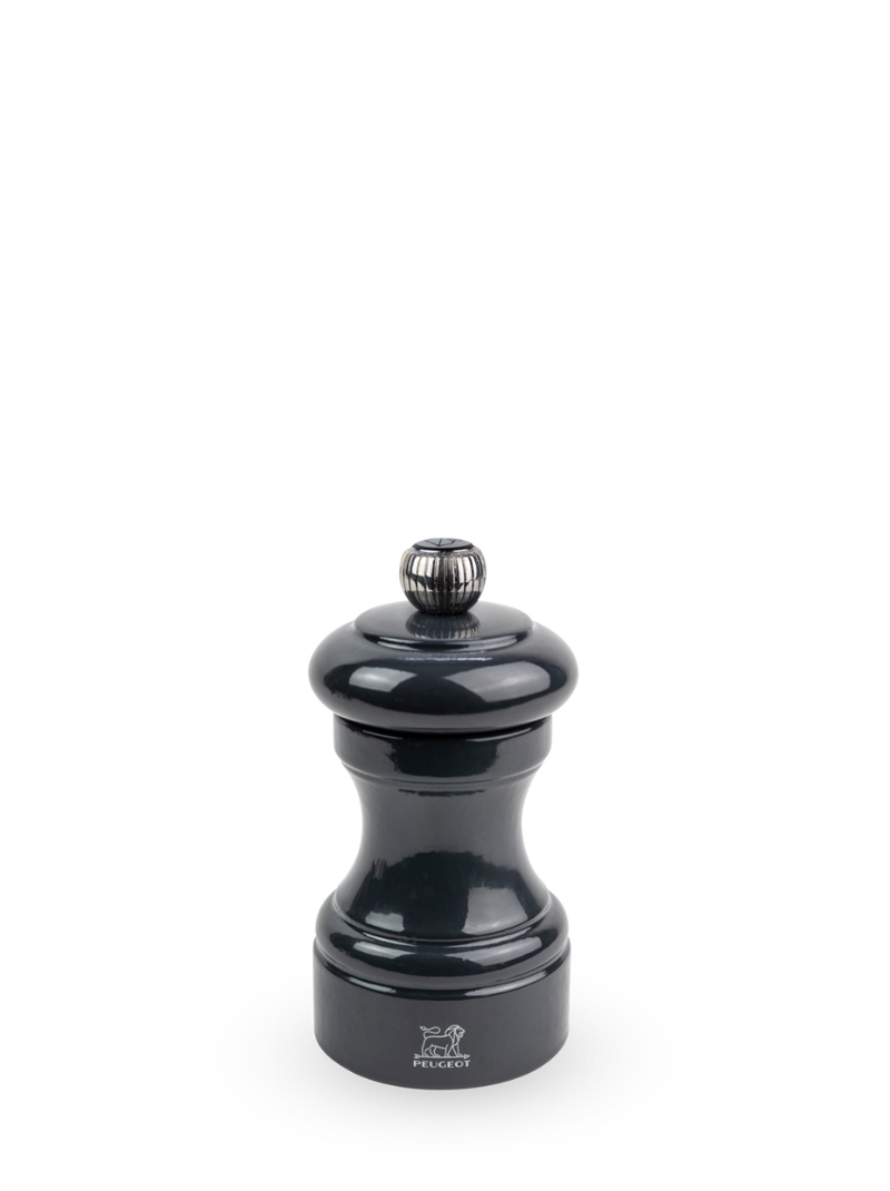Peugeot | Bistro Pepper Mill 4 Inches, Slate Grey, featuring an elegant design with adjustable grind size, ideal for enhancing kitchen table settings.