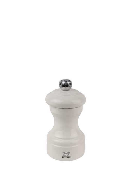 Peugeot | Bistro Pepper Mill, Ivory: Classic hourglass wooden mill with polished metal knob for adjustable coarseness, featuring Peugeot's lifetime-guaranteed pepper mechanism.