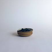 Sarah Kersten - Olive Dish: Basin Collection: Yosemite, featuring a shallow ceramic bowl filled with blueberries, showcasing its versatility for serving appetizers like olives.