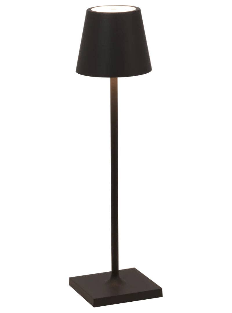 Zafferano America - Poldina Pro Micro Cordless Lamp: White, featuring a sleek black design with a dimmable LED light and contact induction charging base.