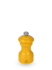 Peugeot | Bistro Salt Mill, Saffron: Glossy yellow tabletop pepper mill, crafted in France from sustainable wood, part of the Bistrorama collection at Athens Cooks.
