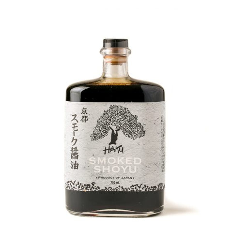 Mikuni Wild Harvest USA | Haku Smoked Shoyu in a clear flask with a stylized tree label, offering a unique smoked soy sauce flavor from Kyoto.