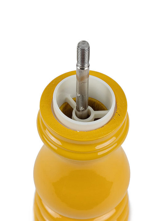 Top view of Peugeot Paris U'Select Saffron Salt Mill, 7 inches, showing its internal grinding mechanism with the adjustment knob removed.