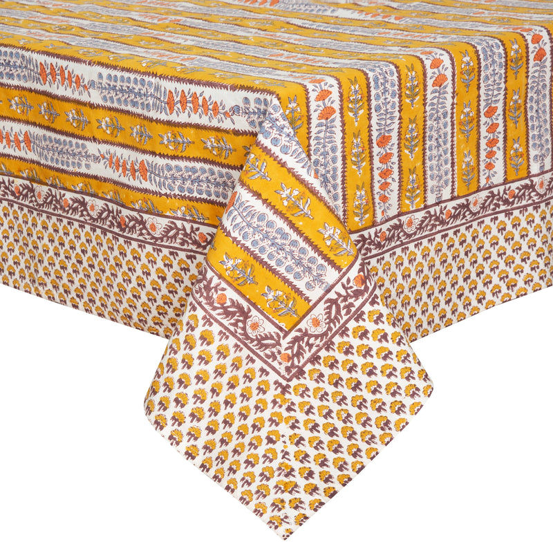 Couleur Nature - Provence Avignon Dijon & Blue Tablecloth: 59 x 86, featuring mustard-yellow and off-white bands with floral motifs, elegantly draped on a table.