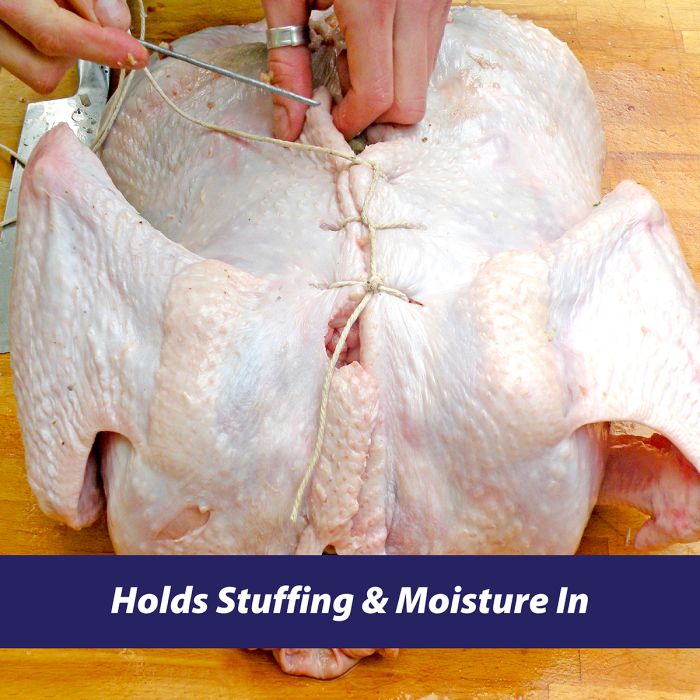 Person using Harold Imports Trussing Needles to prepare turkey, showcasing their utility in securely binding meat for cooking.