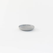 Sarah Kersten - Olive Dish: Basin Collection: Dove Grey features a small, round dish perfect for serving olives or bread at your kitchen gatherings.