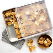 Nordic Ware | Naturals High Sided Sheetcake Pan with Lid, displaying a tray of brownies, perfect for storing and transporting baked goods, available at Athens Cooks.