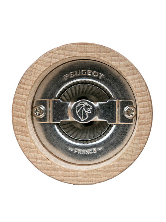 Underside of Peugeot | 1874 Manual Wooden Salt Mill, showcasing the metal grinding mechanism stamped PEUGEOT and FRANCE with a lion logo, highlighting craftsmanship.