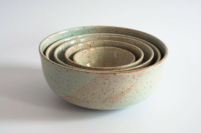 RachaelPots | Set of Three Nesting Bowls - Robin's Egg Blue: Hand-thrown ceramic bowls with speckled minty-cream glaze, ideal for versatile kitchen use.