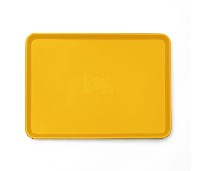 Great Jones | Holy Sheet - Pepper: A nonstick ceramic-coated, half-sized sheet pan ideal for easy cleanup. Suitable for oven use and stylish enough for table presentation.
