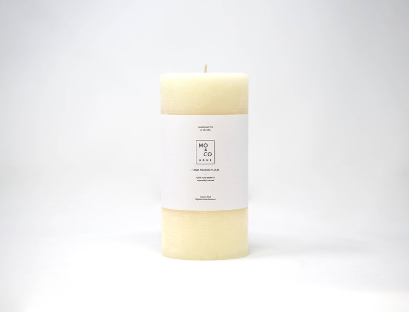 Mo&Co Home - 100% Beeswax Pillar Candle, Natural White, 3x4 Inch. Features a white label, sustainably sourced, eco-friendly beeswax with cotton wick.