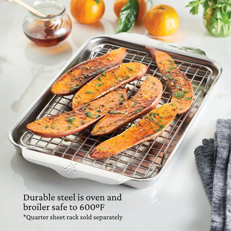 Hestan Oven Bond Tri-Ply Quarter Sheet Pan with glazed sweet potato wedges on the rack, showcasing oven-safe durability and even heat distribution for perfect roasting.