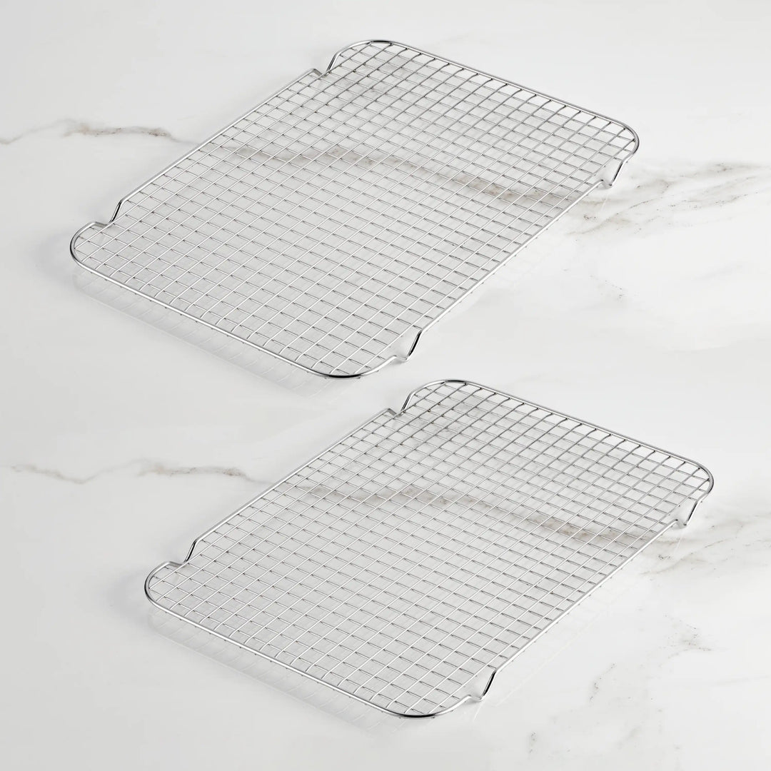 Hestan Provisions OvenBond Tri-Ply Bakeware, Half Sheet Single Rack on marble, showcasing stainless-steel design for roasting and cooling versatility.