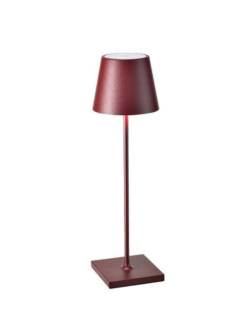 Zafferano America - Poldina Pro Cordless Lamp: Rust; a sleek, conical lampshade on a minimalist stem, ideal for ambient lighting, cordless and rechargeable for versatile use.