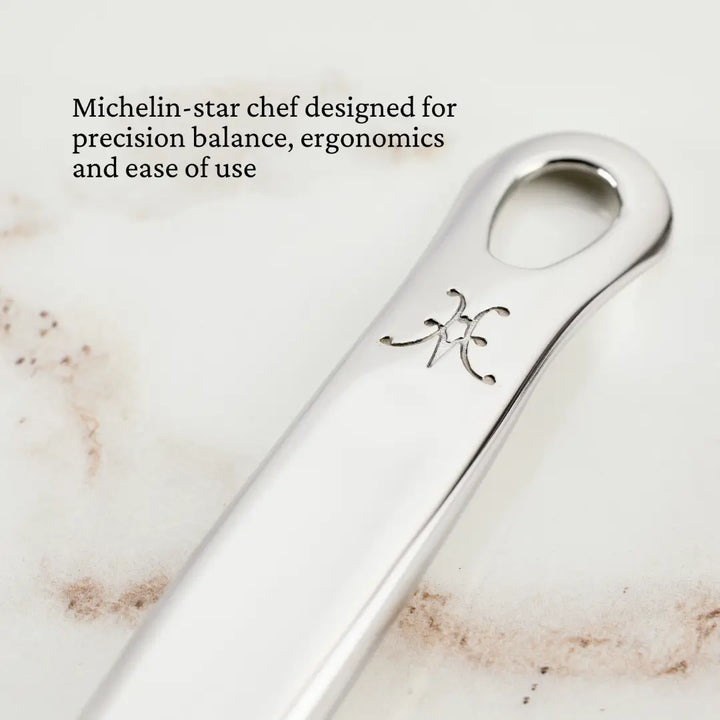 Stainless Steel Deep Spoon, 13 with intricate design, ideal for kitchen use. Featured in Athens Cooks for culinary enthusiasts.