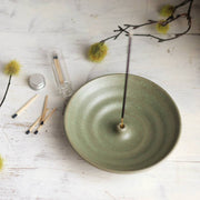 Gravesco Pottery - Incense Burner elegantly holds incense with scattered matches, reflecting Athens Cooks' commitment to quality kitchen and home accessories.