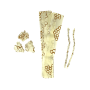 Bee's Wrap - ReKindle Fire Starters™: A stack of reusable beeswax-coated wraps with honeycomb pattern and strips, ideal for eco-friendly fire starting in camping or cooking.