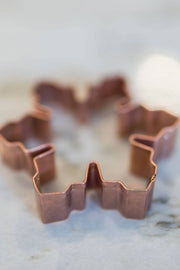 Galley and Fen - Christmas Cookie Cutters - Set of 6, featuring a snowflake-shaped copper cutter, ideal for festive baking.