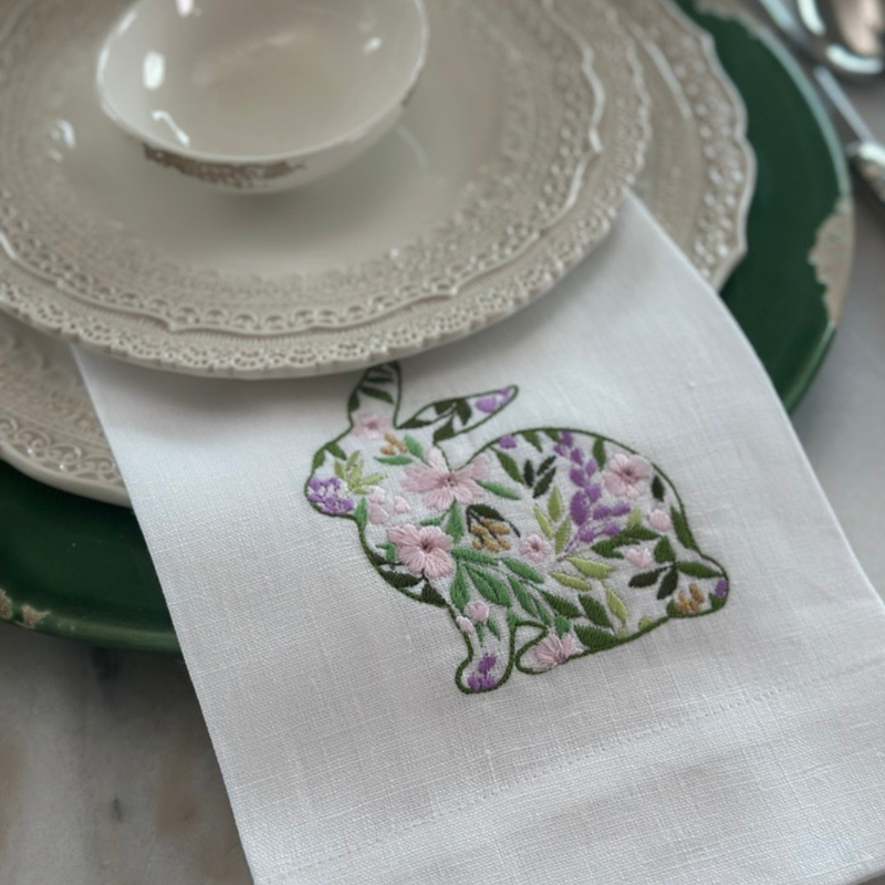 Garden Bunny Linen Towel featuring an embroidered floral toile bunny design, ideal as a festive kitchen decor or hostess gift for Easter celebrations.