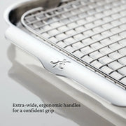 Hestan Provisions | OvenBond Tri-Ply Bakeware, Medium Sheet Pan with Rack features ergonomic handles and a wire-grid surface on a shallow tray for efficient roasting.