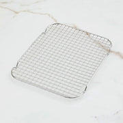Hestan | OvenBond Tri-Ply Bakeware, Medium Rack Only, a stainless-steel cooling rack ideal for baking and roasting, enhancing air circulation in your kitchen.