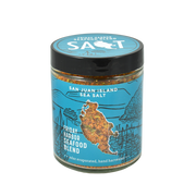 San Juan Island Sea Salt - Friday Harbor Seafood Seasoning Blend in a clear glass jar with a black lid, perfect for enhancing seafood dishes with a balanced spice.