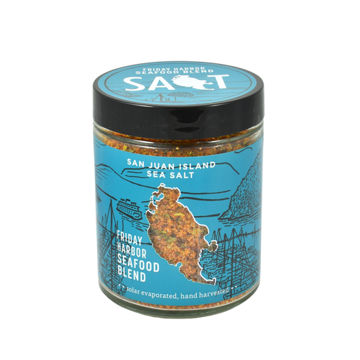 San Juan Island Sea Salt - Friday Harbor Seafood Seasoning Blend in a clear glass jar with a black lid, perfect for enhancing seafood dishes with a balanced spice.