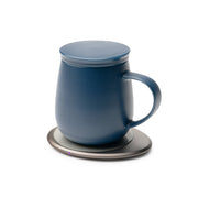 OHOM - Ui 3 Self-heating Mug Set: Jasmine White, featuring a blue ceramic mug with lid on a smart electronic coaster, ideal for keeping beverages warm and charging devices.