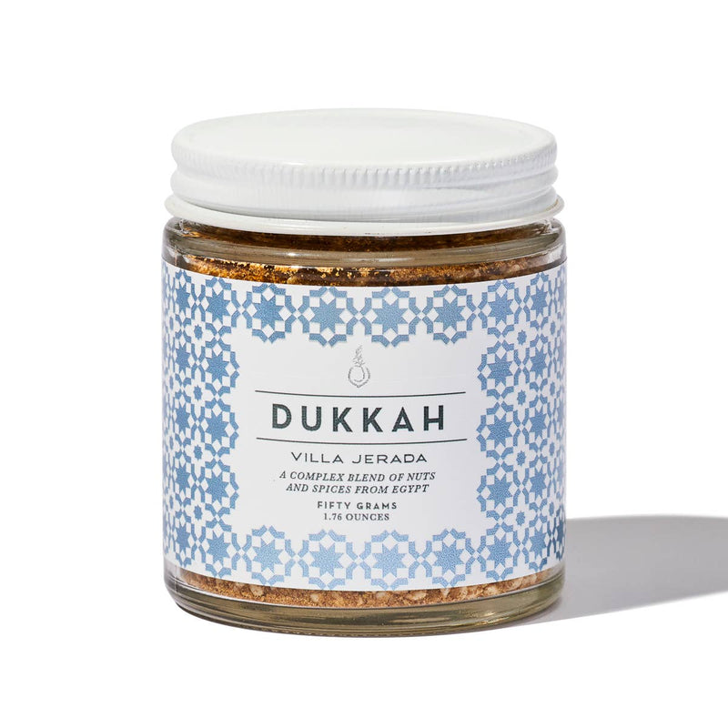 Villa Jerada - Dukkah - 50g: A small glass jar of Egyptian nut and spice blend, ideal for enhancing dips, meats, and traditional dishes.